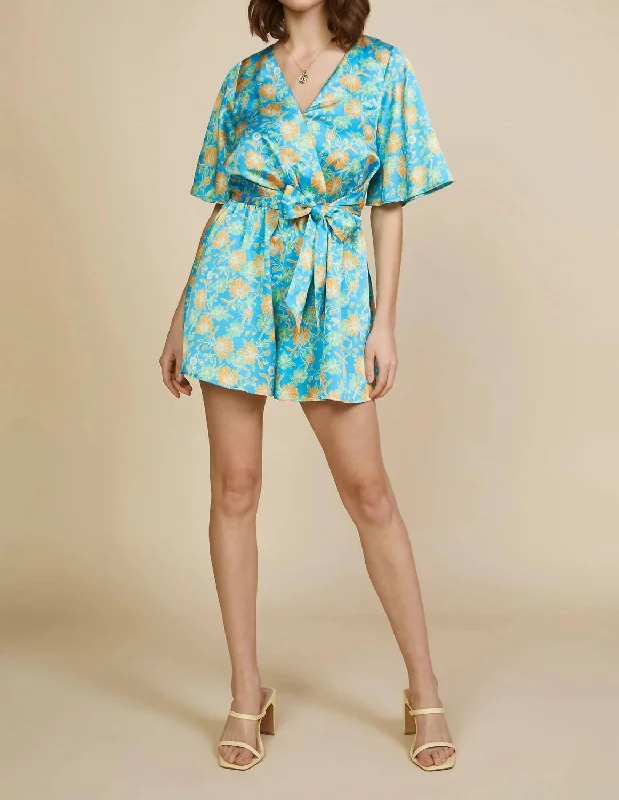 Floral Print Surplice Romper In Vivid Blue